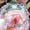 Bratara placata cu aur alb, cu cristale rose oval cut si cristale swarovski clear- bijuterii mireasa