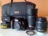 Nikon D3100 kit 18-55mm VR + 55-200mm VR + geanta Nikon si UV Filter cadou