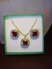 Set placat cu aur de 18k, format din colier si cercei cu cristale rubin princess cut si cristale swarovski clear, bijuterii mireasa