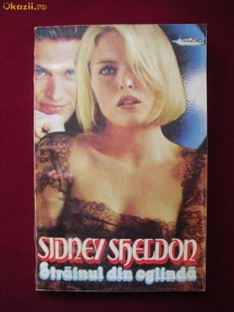 Y17B  Sidney Sheldon - Strainul din oglinda foto