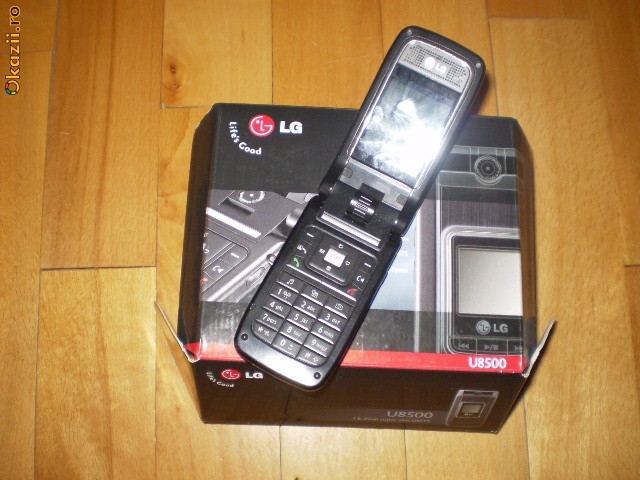 Lg u8500 liber retea cutie+incarcator cu defect la baterie(tine cam 1, 2 zile) foto mare